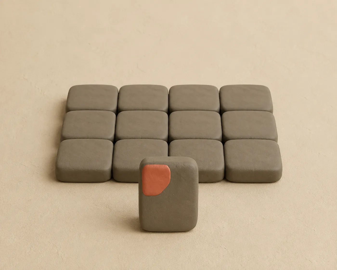 Zwölf gleich große Clay-Plättchen liegen als geschlossener Block, ein einzelnes Plättchen steht aufrecht davor.
